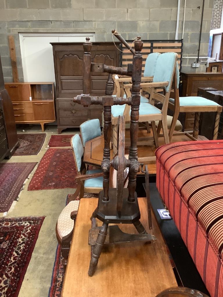 A provincial turned beech spinning wheel, height 100cm